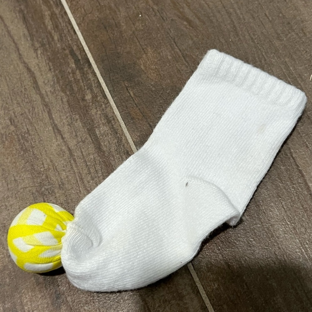 Lovevery White & Yellow Jingle Play Sock